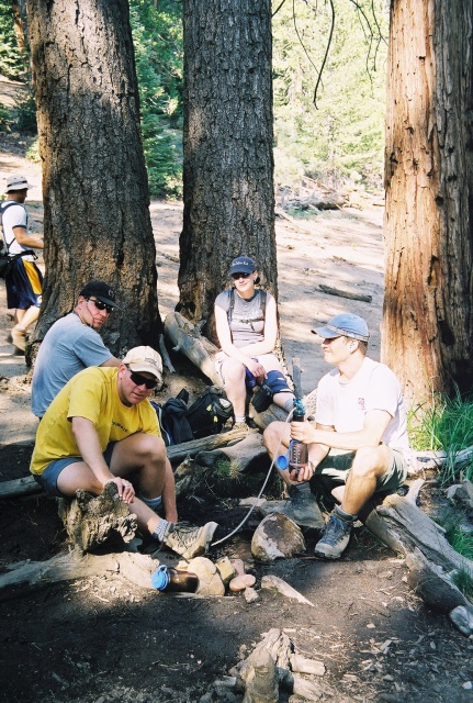 Refilling our water bottles at a trail-side spring