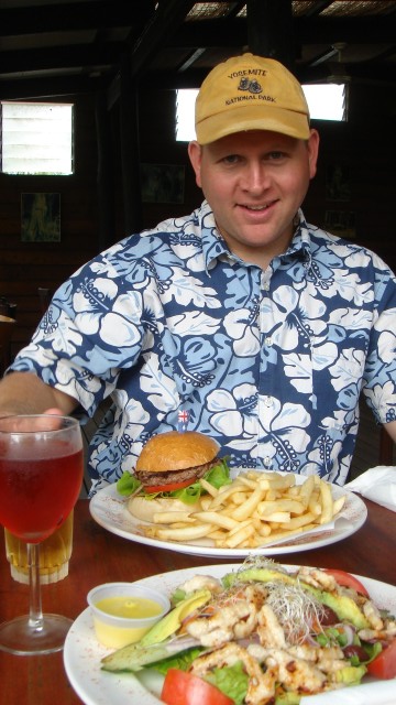 Enjoying a burger and gator salad